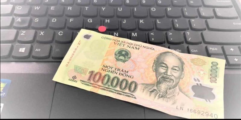 Mơ nhặt được tiền 100 nghìn theo thần số học là gì?