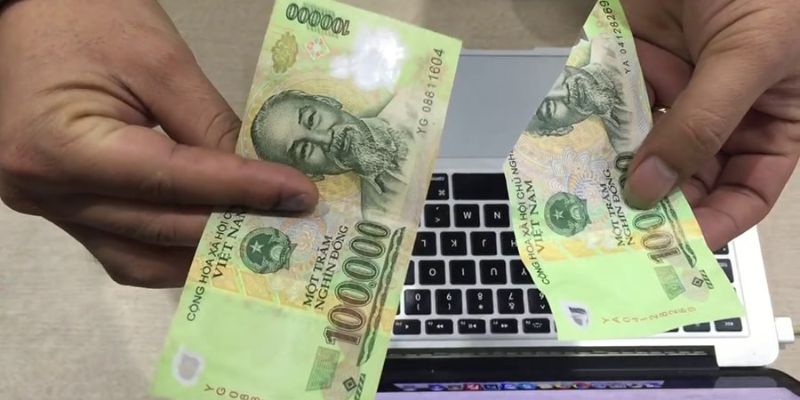 Nằm mộng thấy mơ nhặt được tiền 100 nghìn không nguyên vẹn